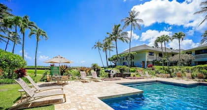 First-floor condo w/ ocean view, washer/dryer, & outdoor pool