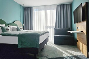 Premium Room, 1 Queen Bed with Sofa bed (Up to 3 Adults) | In-room safe, desk, soundproofing, free cribs/infant beds