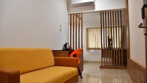 FAMILY QUADRUPLE ROOM | Desk, bed sheets - Hotel Adhikrishna Arcade, Erode (Erode)
