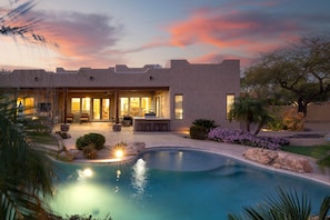 A modern house with a swimming pool, patio, and outdoor seating area. - Sprawling Arizona Oasis w/ Dream Backyard (New River)