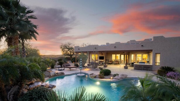 A modern house with a pool, patio, and outdoor seating area. - Sprawling Arizona Oasis w/ Dream Backyard (New River)