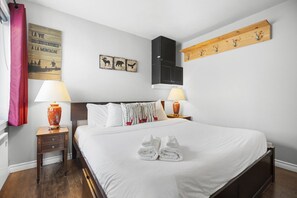 1 bedroom, desk, iron/ironing board, travel cot