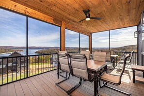Outdoor dining - Luxury Lakefront Lodge | 6BR Modern Retreat + FREE Tickets, Pools & Amenities (Kimberling City)
