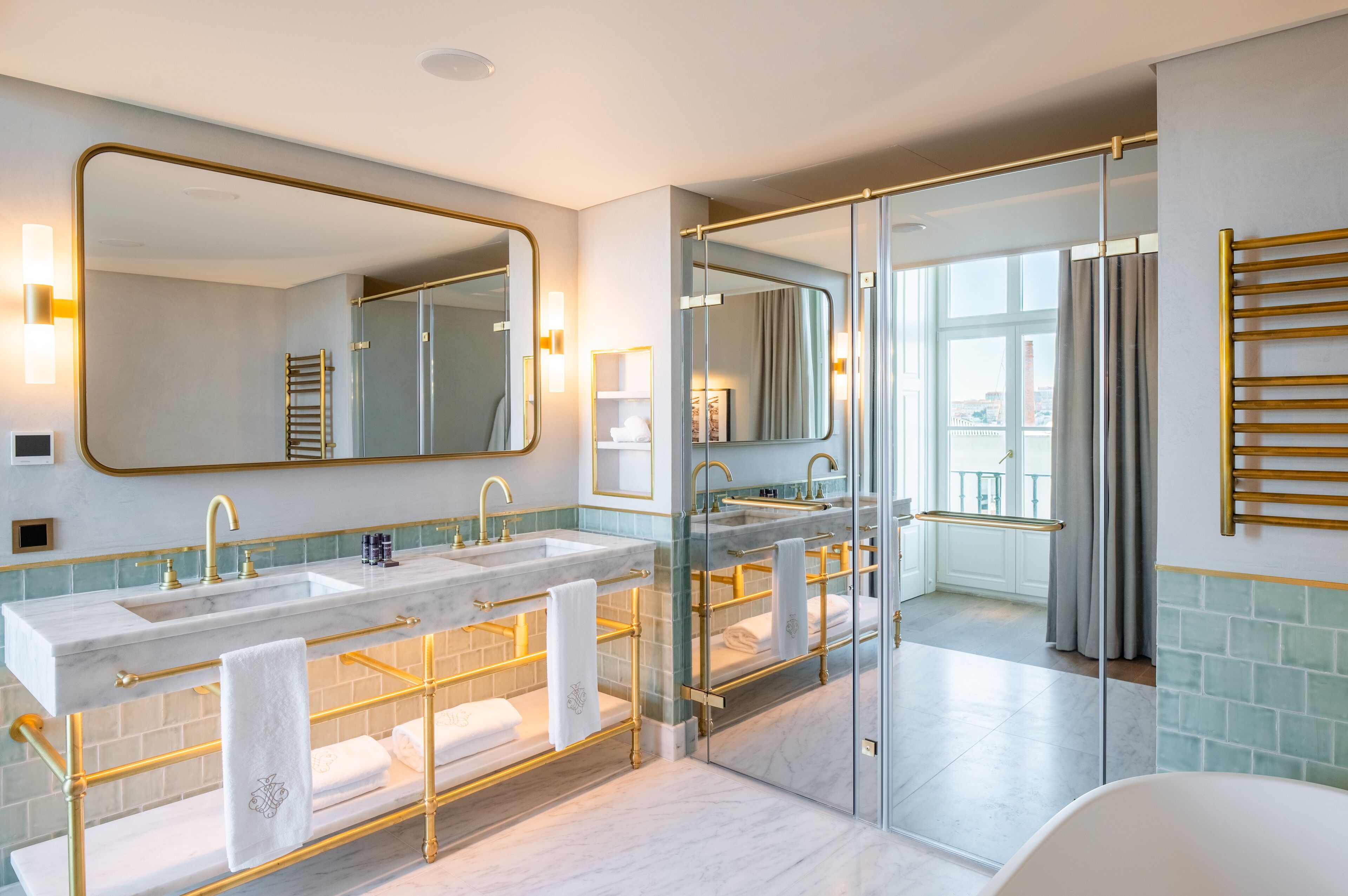 signature suite | bathroom | free toiletries, hair dryer, bathrobes, slippers