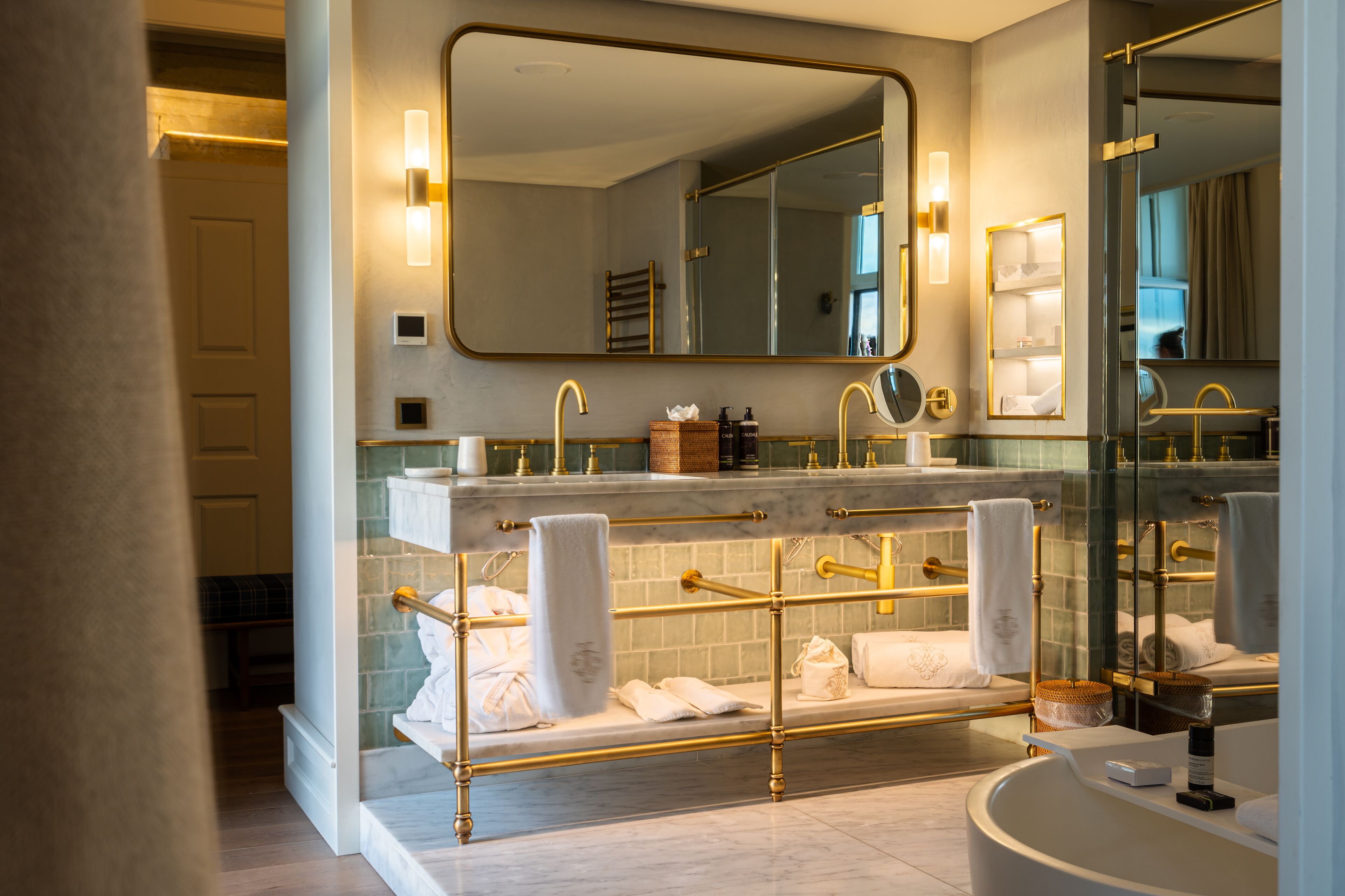 signature suite | bathroom | free toiletries, hair dryer, bathrobes, slippers
