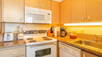 Condo, 2 Bedrooms | Private kitchen | Stovetop, toaster, cookware/dishes/utensils, dining tables