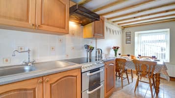 Fridge, microwave, oven, cookware/dishes/utensils