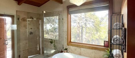 Bathtub, jetted tub, hair dryer, towels