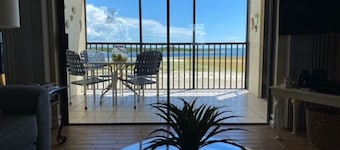 Beach front with 2 bedrooms, 2 baths and views of the Gulf!