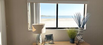 Beach front with 2 bedrooms, 2 baths and views of the Gulf!