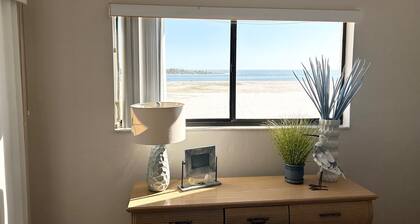 Beach front with 2 bedrooms, 2 baths and views of the Gulf!