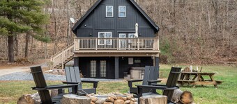 Modern Riverfront A-Frame Cabin w/ Hot Tub, Fire Pit, Kayaks, Canoe, & Arcade