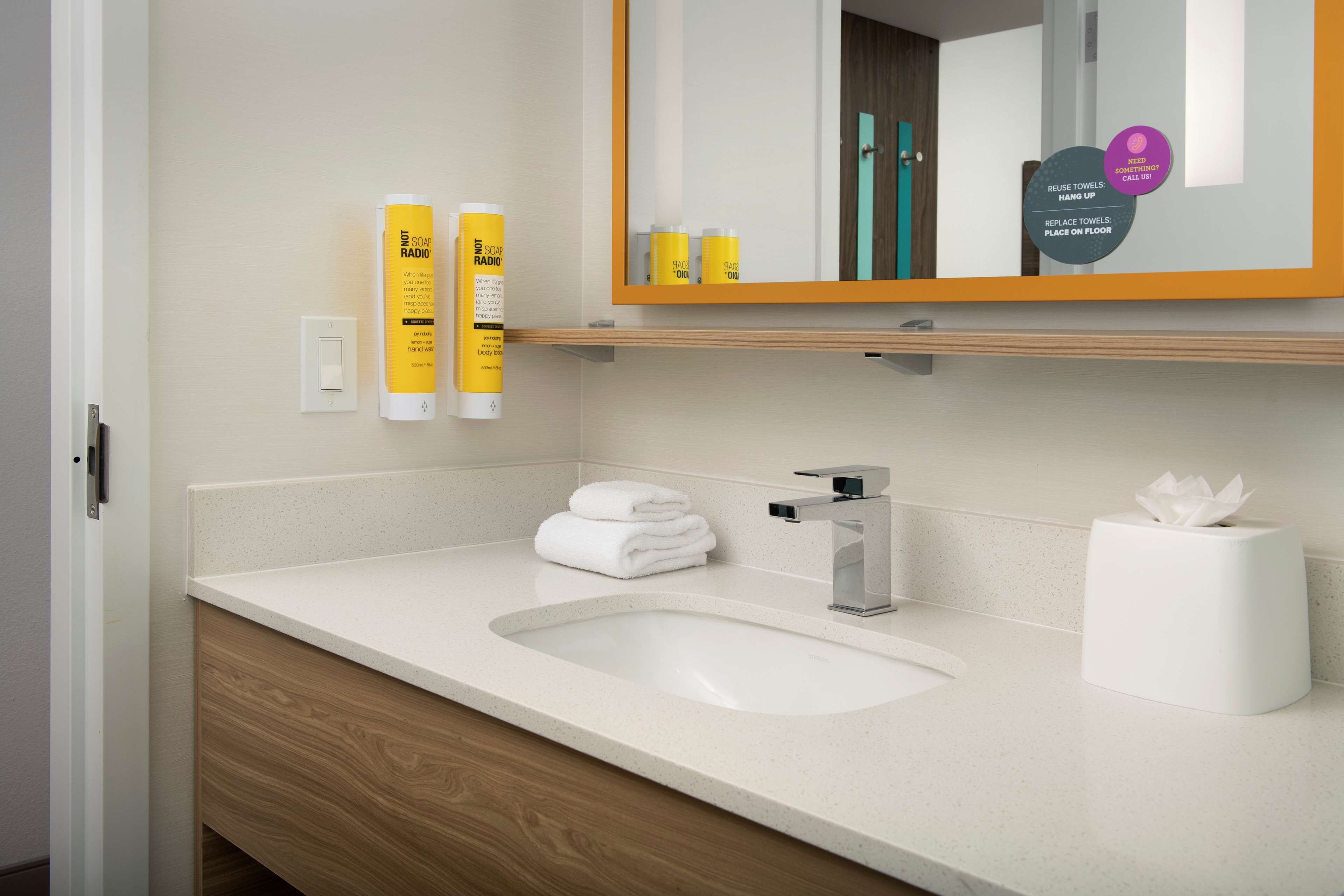 hair dryer, towels, soap, shampoo