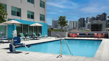 Outdoor pool, pool umbrellas, sun loungers