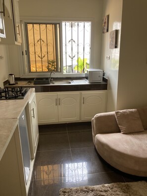 Microwave, electric kettle, toaster, cookware/dishes/utensils