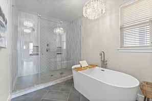 Combined shower/tub, hair dryer, towels, toilet paper