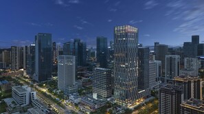 A high-rise urban area with modern skyscrapers and well-lit streets at night. - DoubleTree by Hilton Nanning Wuxiang (Nanning)