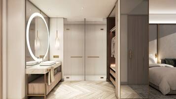 A modern bedroom with a large mirror, a vanity with a sink, and a bed with a headboard.