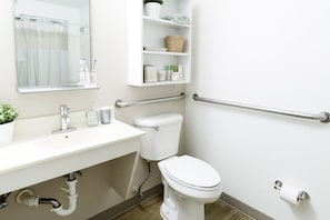 Combined shower/tub, towels, soap, toilet paper