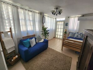 1 bedroom, desk, iron/ironing board, travel crib