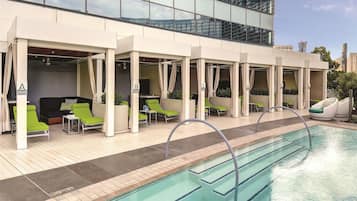 Outdoor pool, pool umbrellas, sun loungers