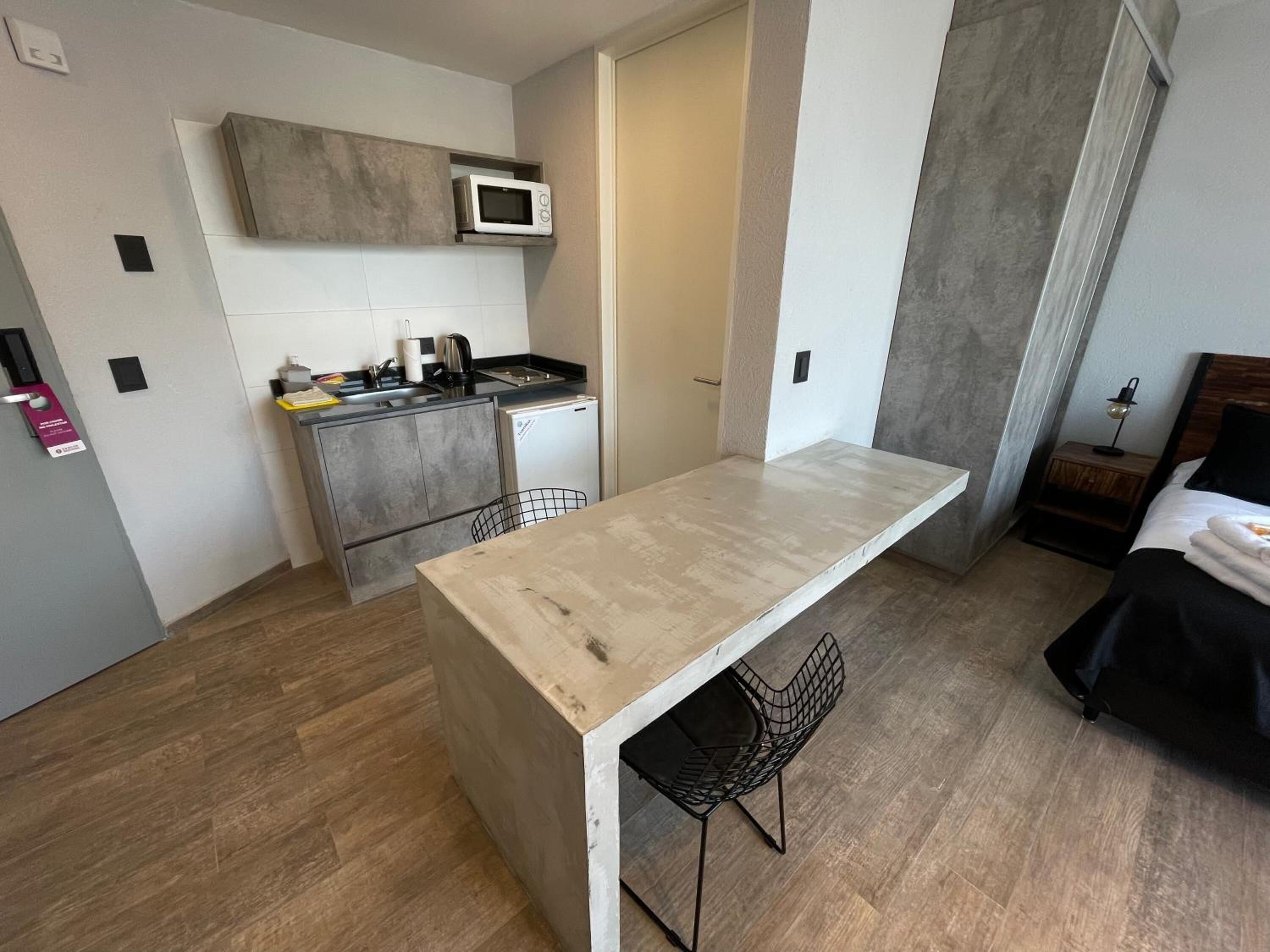 Mini-fridge, microwave, stovetop, coffee/tea maker