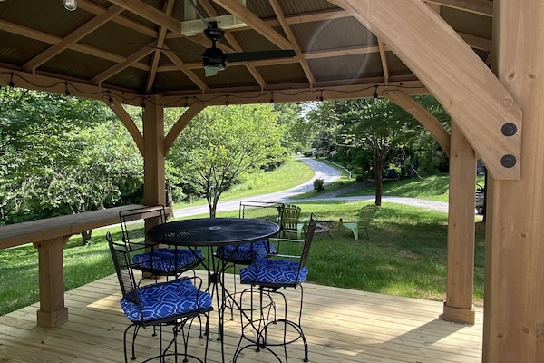 Peaceful country road in the distance from under your personal pavilion.