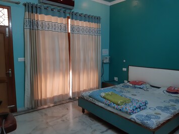 Bedroom 1 of 2BHK Executive Suite SA5. Also, it is part of Apartment SA3.