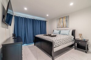 1 bedroom, desk, iron/ironing board, travel crib