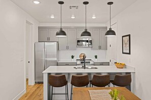 Condo, 3 Bedrooms | Private kitchen | Fridge, oven, coffee/tea maker, toaster