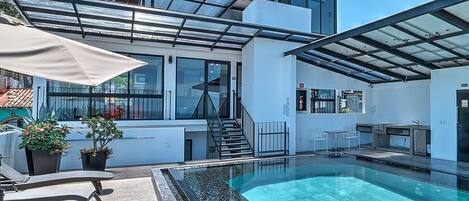 A rooftop pool, a heated pool