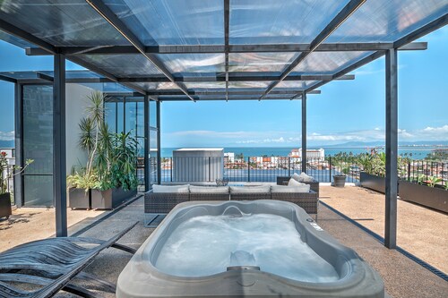 Penthouse Condo with Private Rooftop Terrace. Short walk to the Beach & Malecón.