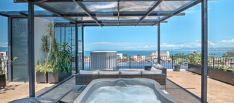 Penthouse Condo with Private Rooftop Terrace. Short walk to the Beach & Malecón.