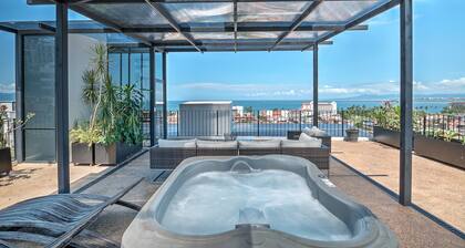 Penthouse Condo with Private Rooftop Terrace. Short walk to the Beach & Malecón.