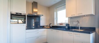 Avslappende naturtilfluktssted med strand