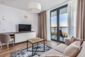 Studio, Balcony, Sea View | Living area | 40-inch Smart TV with satellite channels, TV