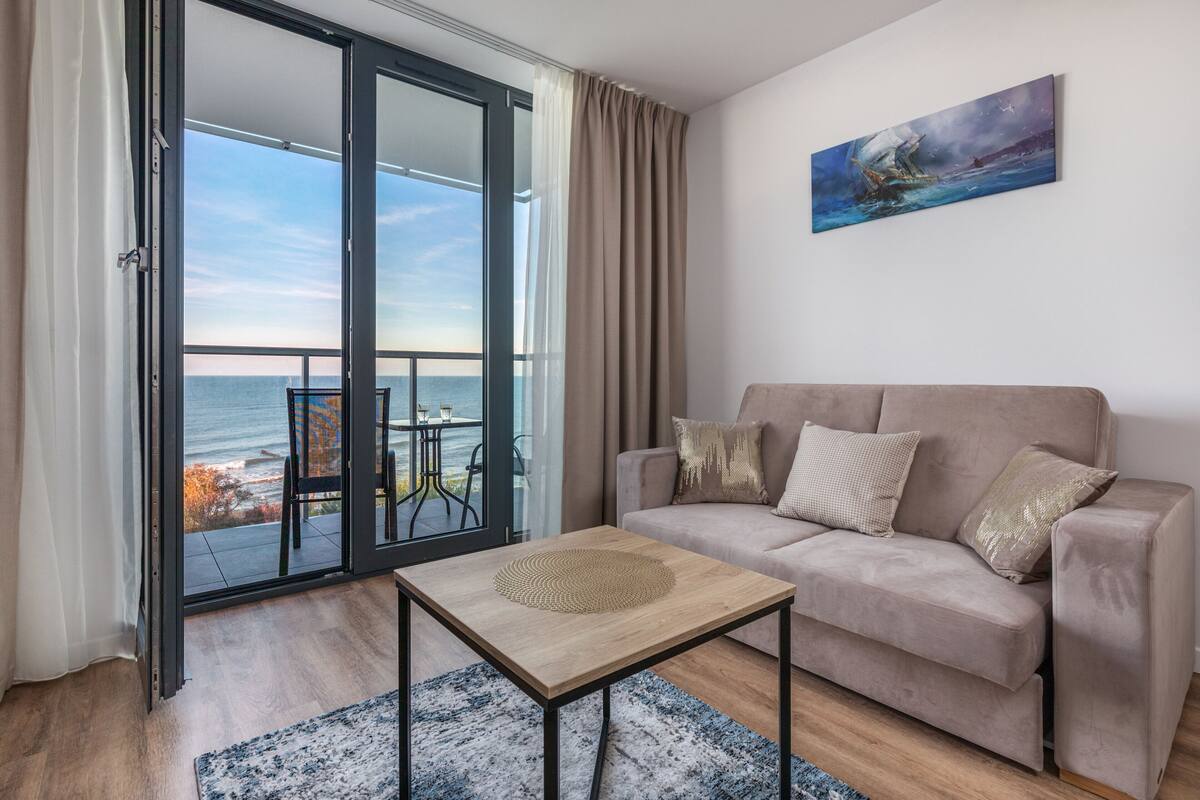Studio, Balcony, Sea View | Living area | 40-inch Smart TV with satellite channels, TV