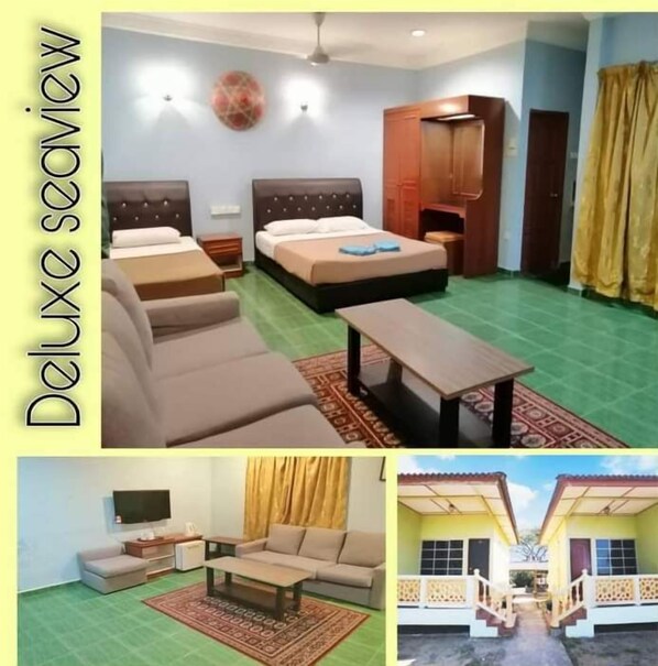 A room with two beds, a sofa, a small table, and a TV. - PCB Beach Resort (Kota Bharu)