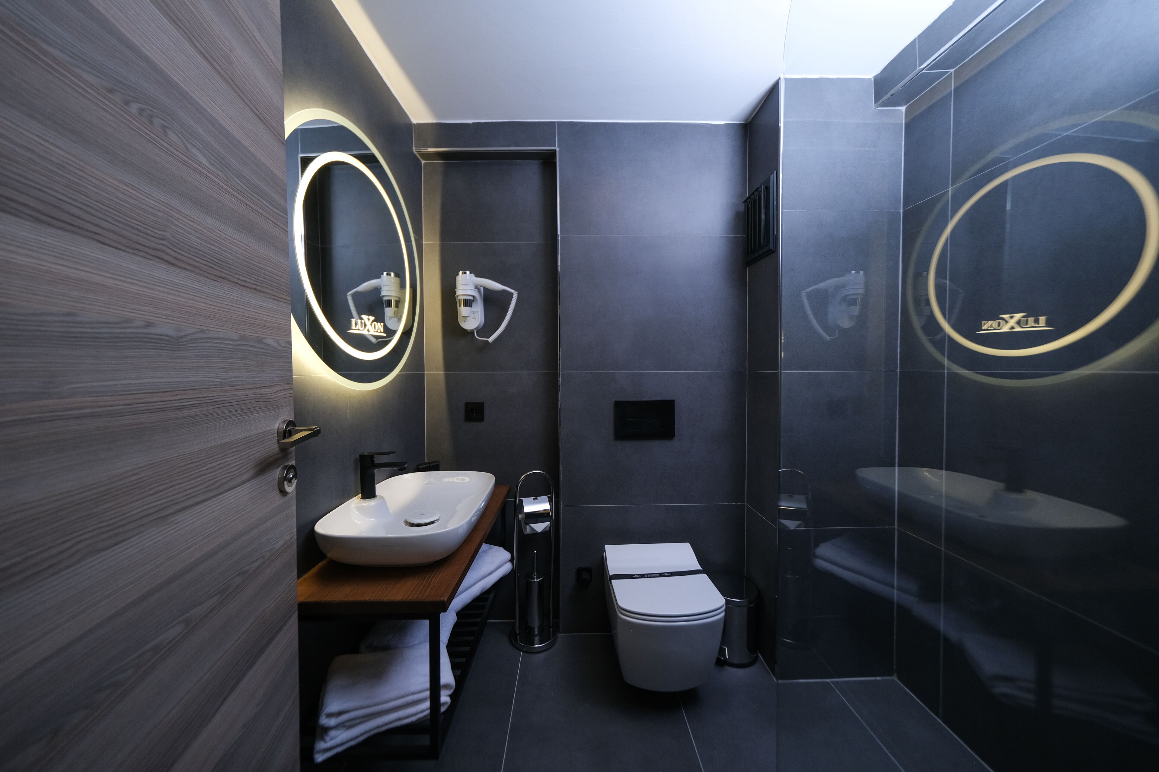 shower, free toiletries, slippers, towels