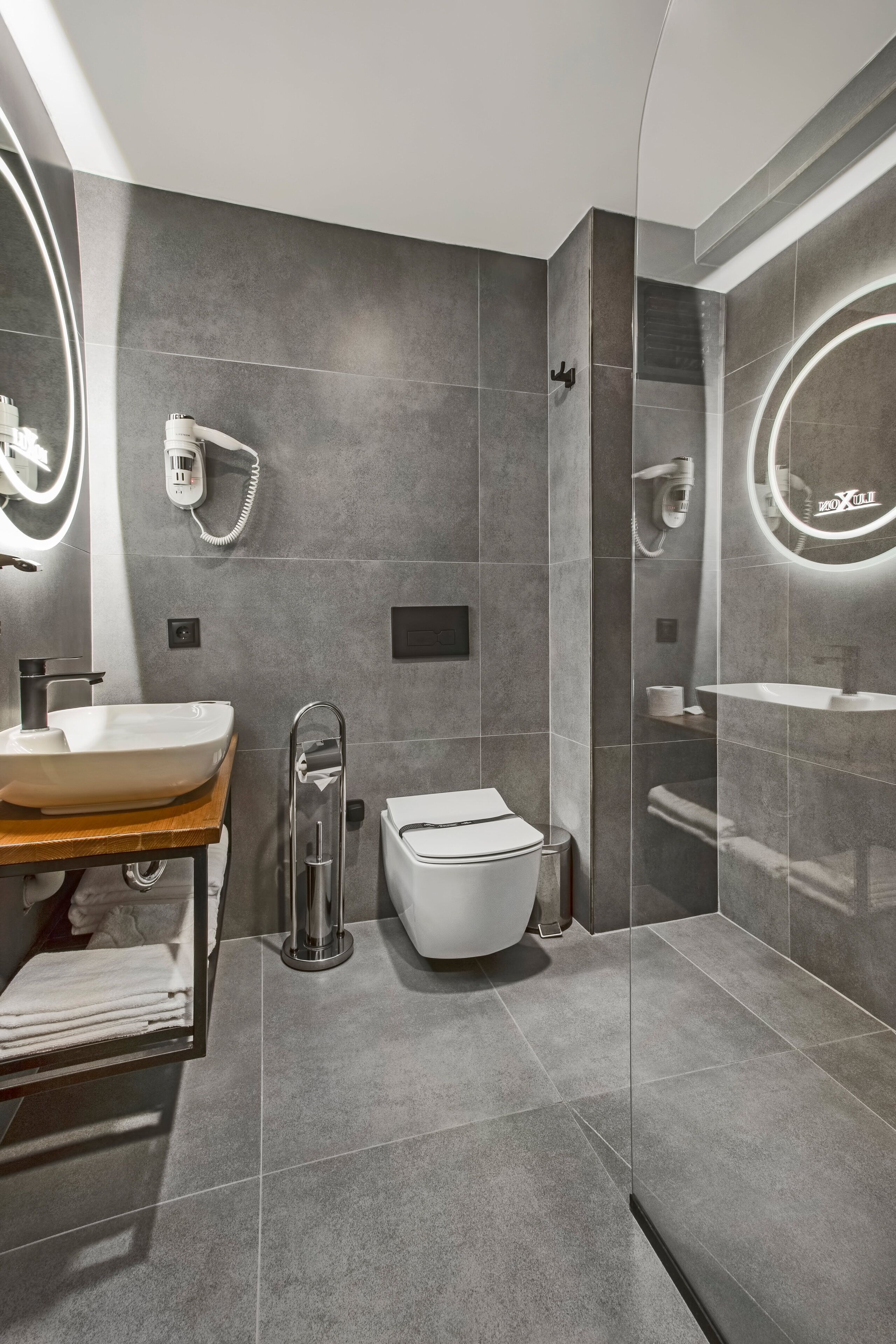 Shower, free toiletries, slippers, towels