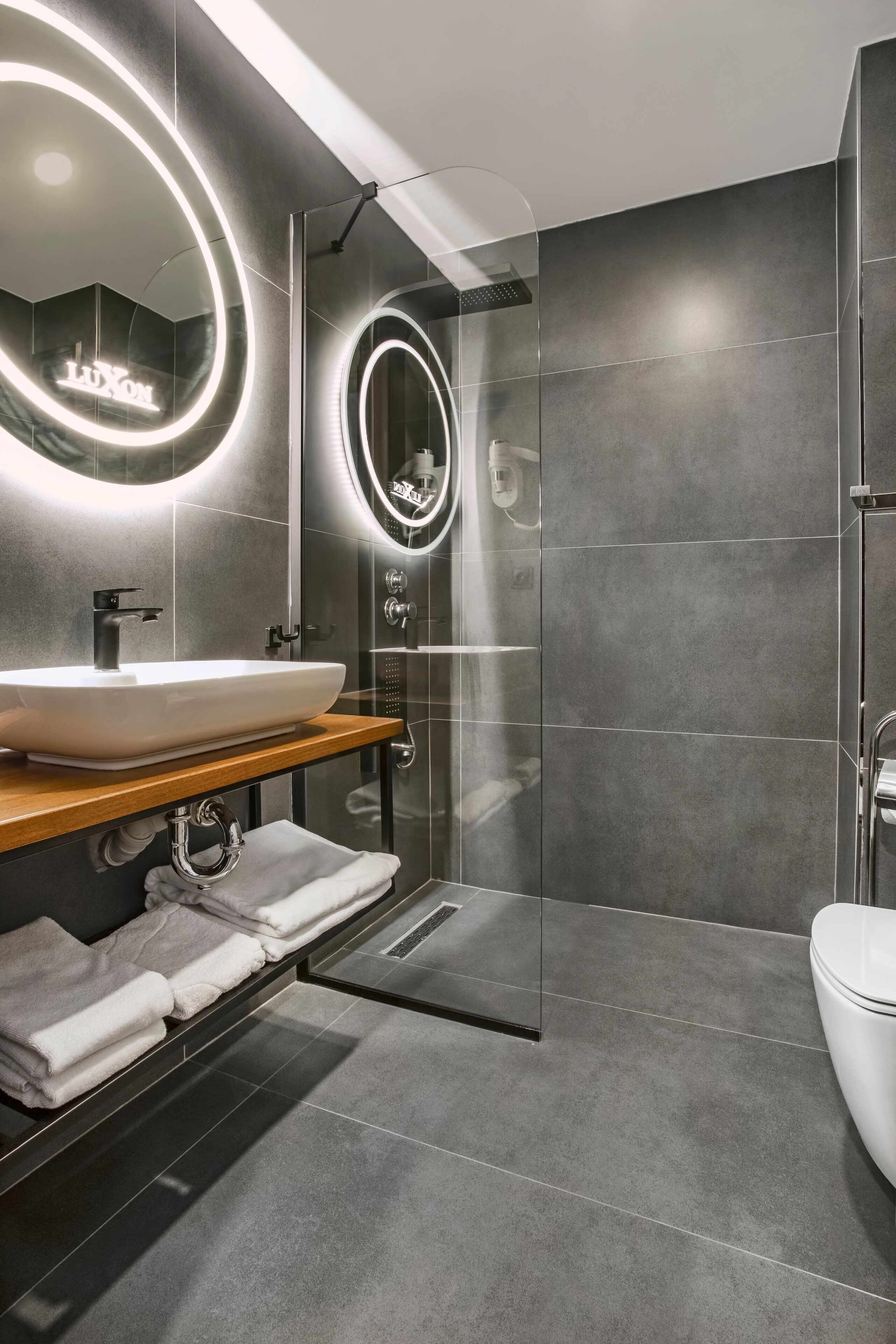 shower, free toiletries, slippers, towels