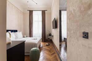 Economy tweepersoonskamer | Een minibar, een kluis op de kamer, gratis wifi, beddengoed