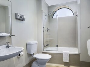 Combined shower/bathtub, hair dryer, towels, soap