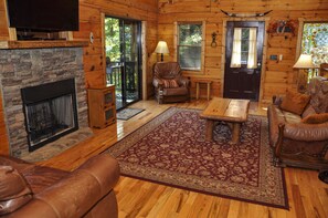 Téléviseur connecté, foyer, lecteur de DVD, livres