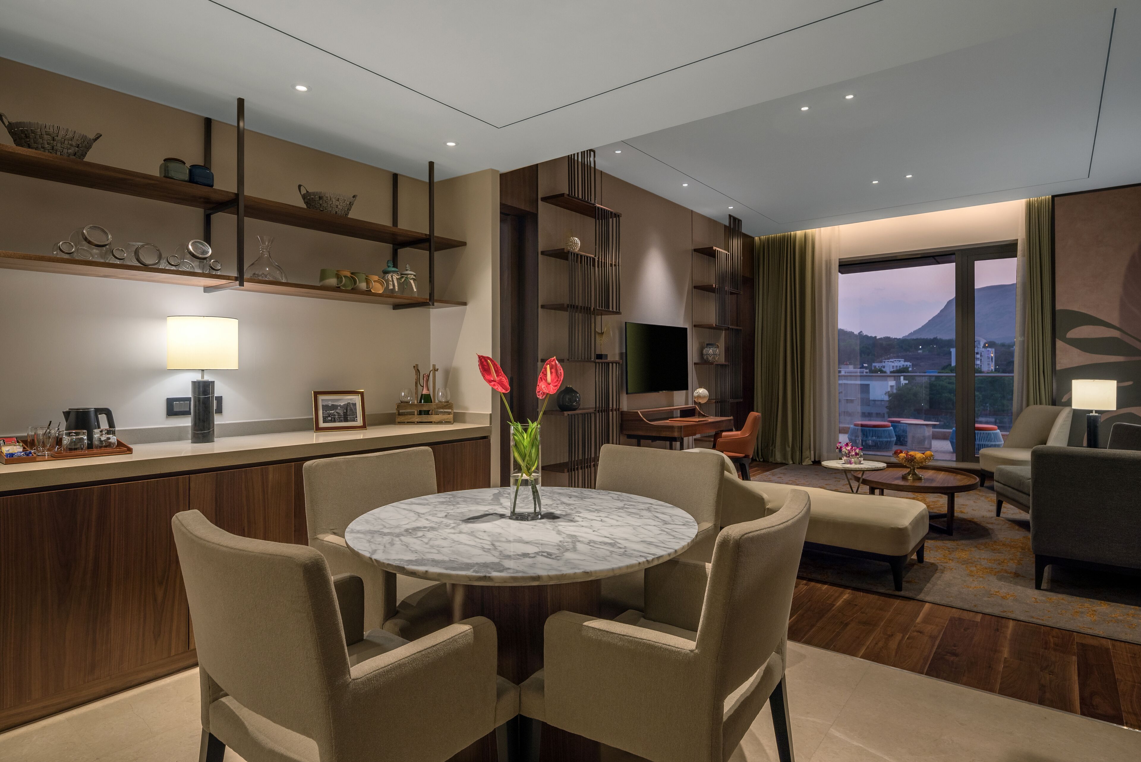 Deluxe Suite | Living area | 40-inch LED TV with satellite channels, TV