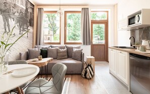 Appartement | Salle de séjour | Télévision à écran plasma de 32 pouces avec chaînes numériques