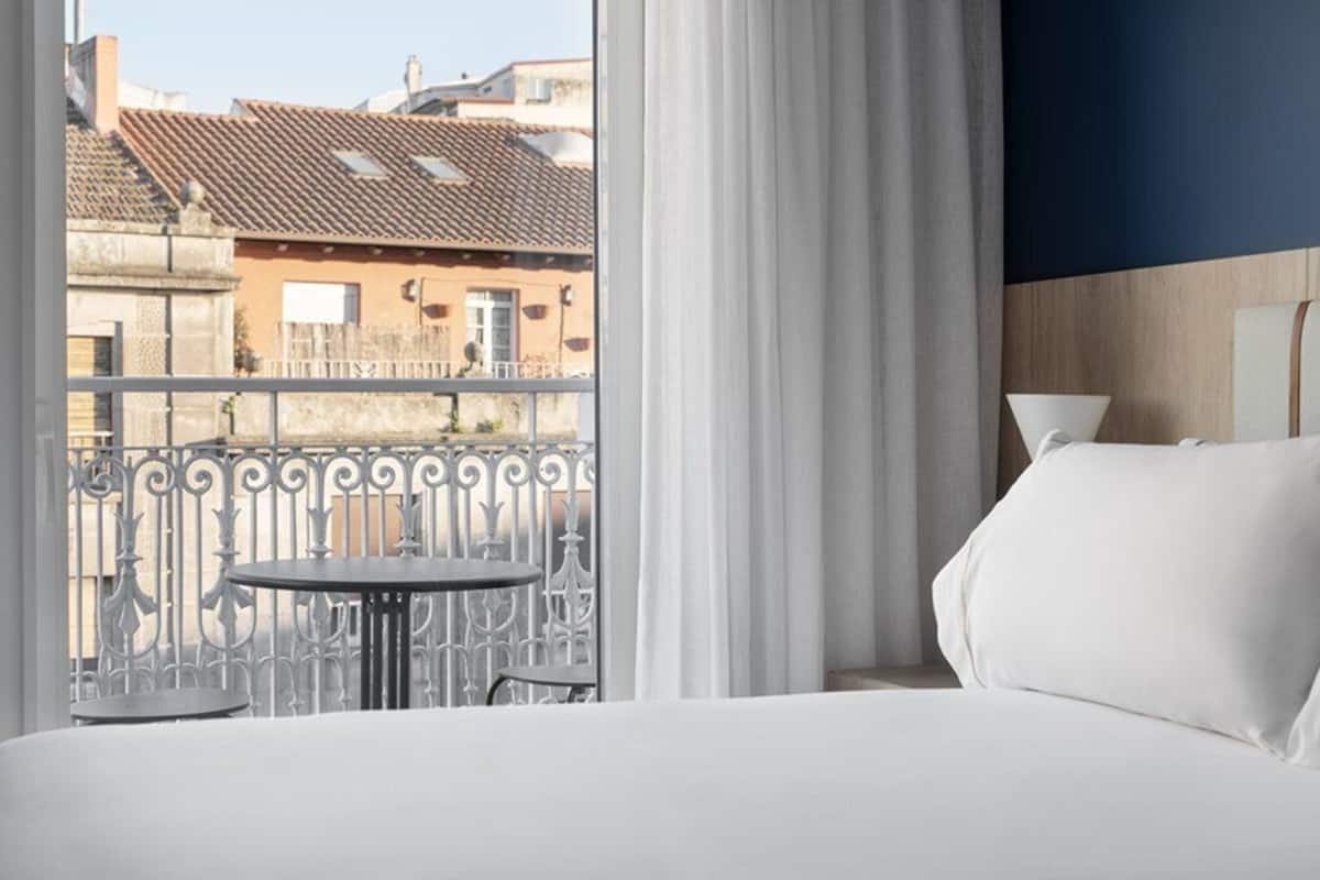 deluxe room, terrace | in-room safe, blackout curtains, soundproofing, iron/ironing board