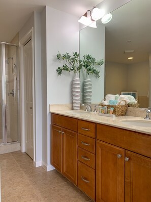 Bathtub, hair dryer, towels, soap