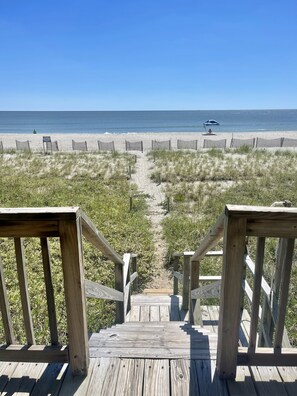 On the beach, sun-loungers