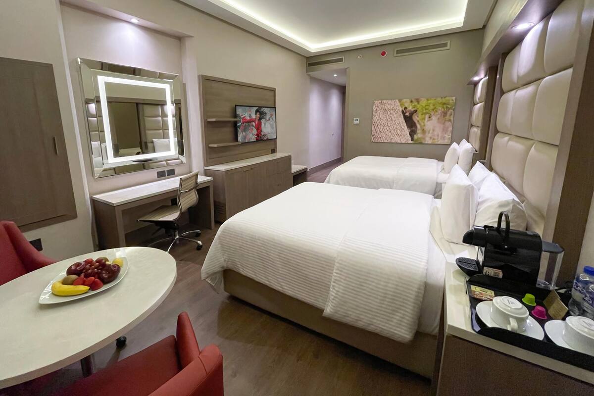 Luxe beddengoed, een kluis op de kamer, een bureau